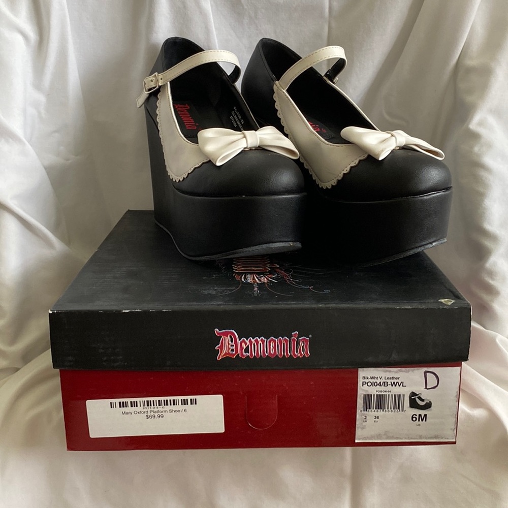 Demonia black and white wedge heel